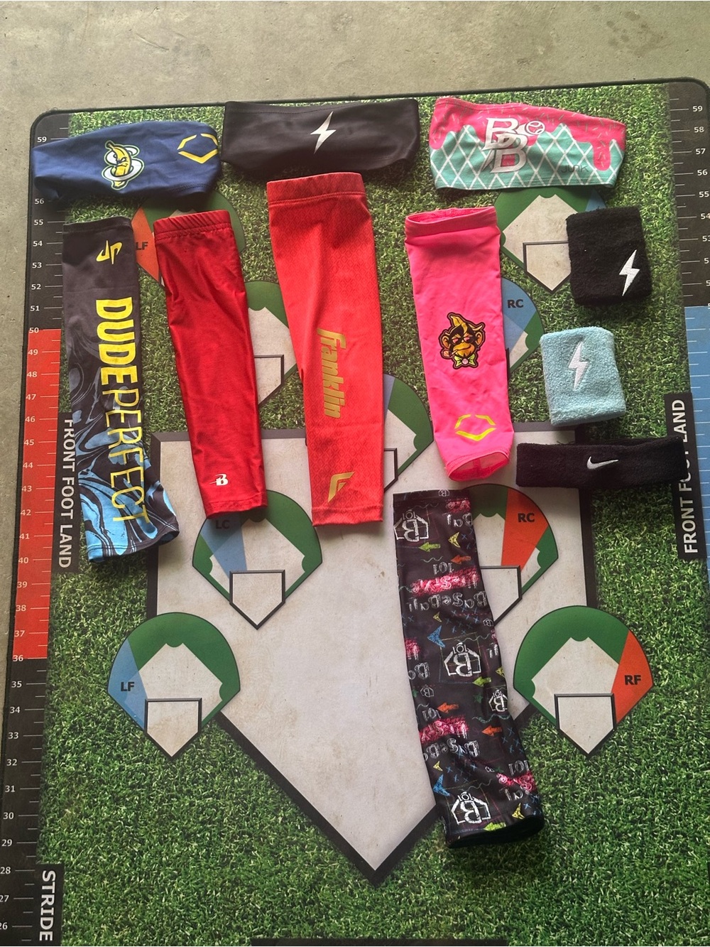 Assorted Youth Baseball Arm Sleeves Wristbands, and Headbands -Bruce Bolt, etc